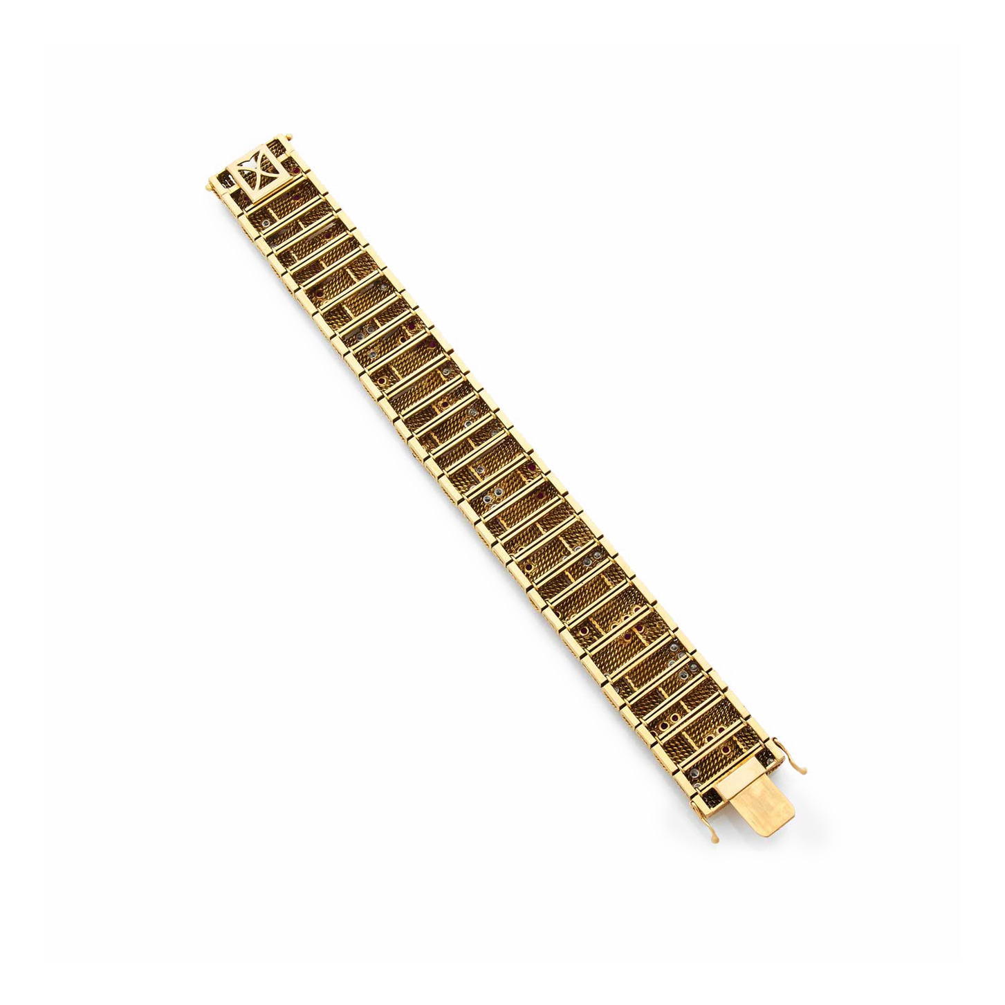 Bracelet en or au motif torsadé serti de rubis et de diamants des années 1970