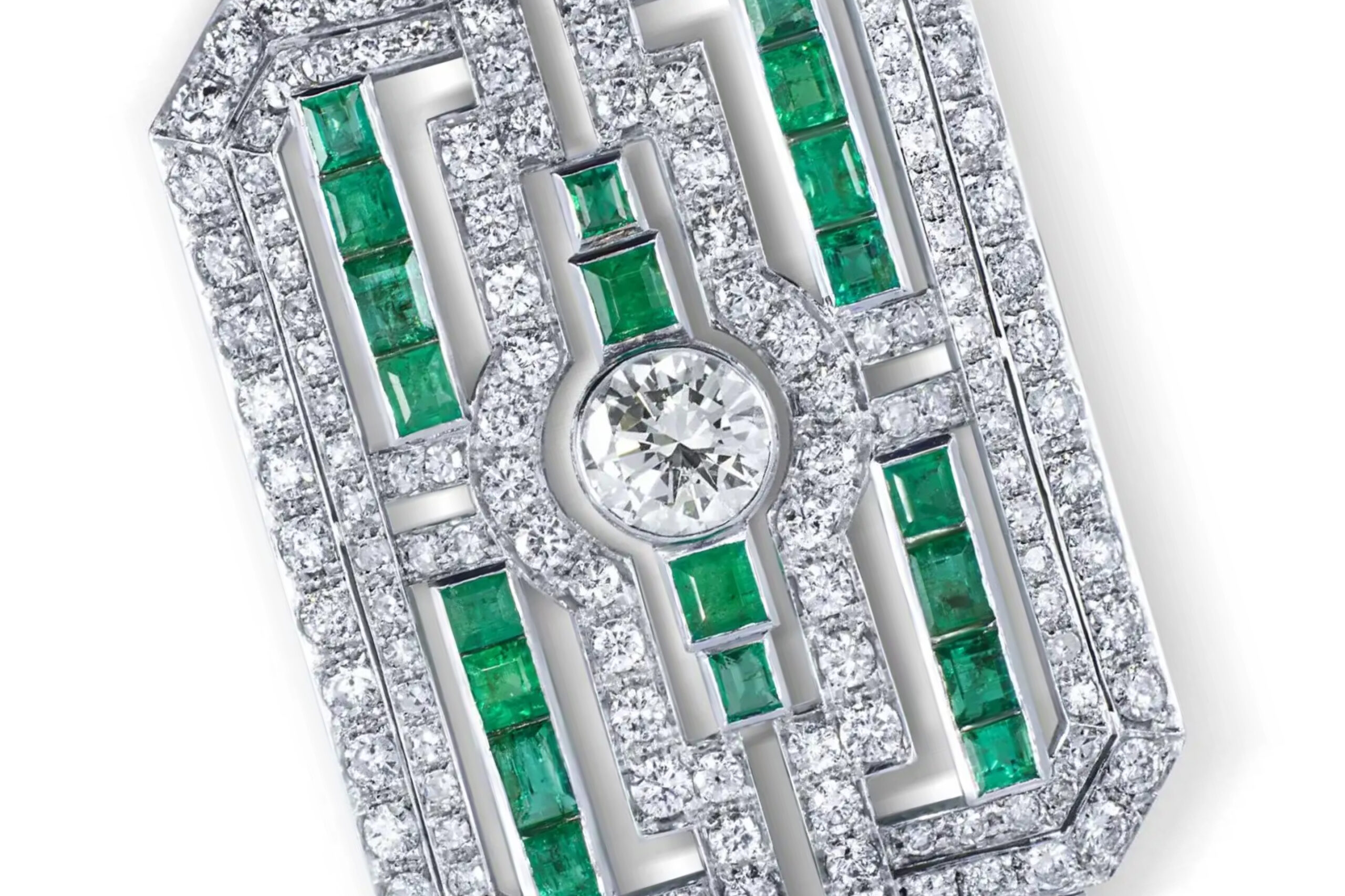 A pear-cut vibrant green emerald with exceptional clarity.