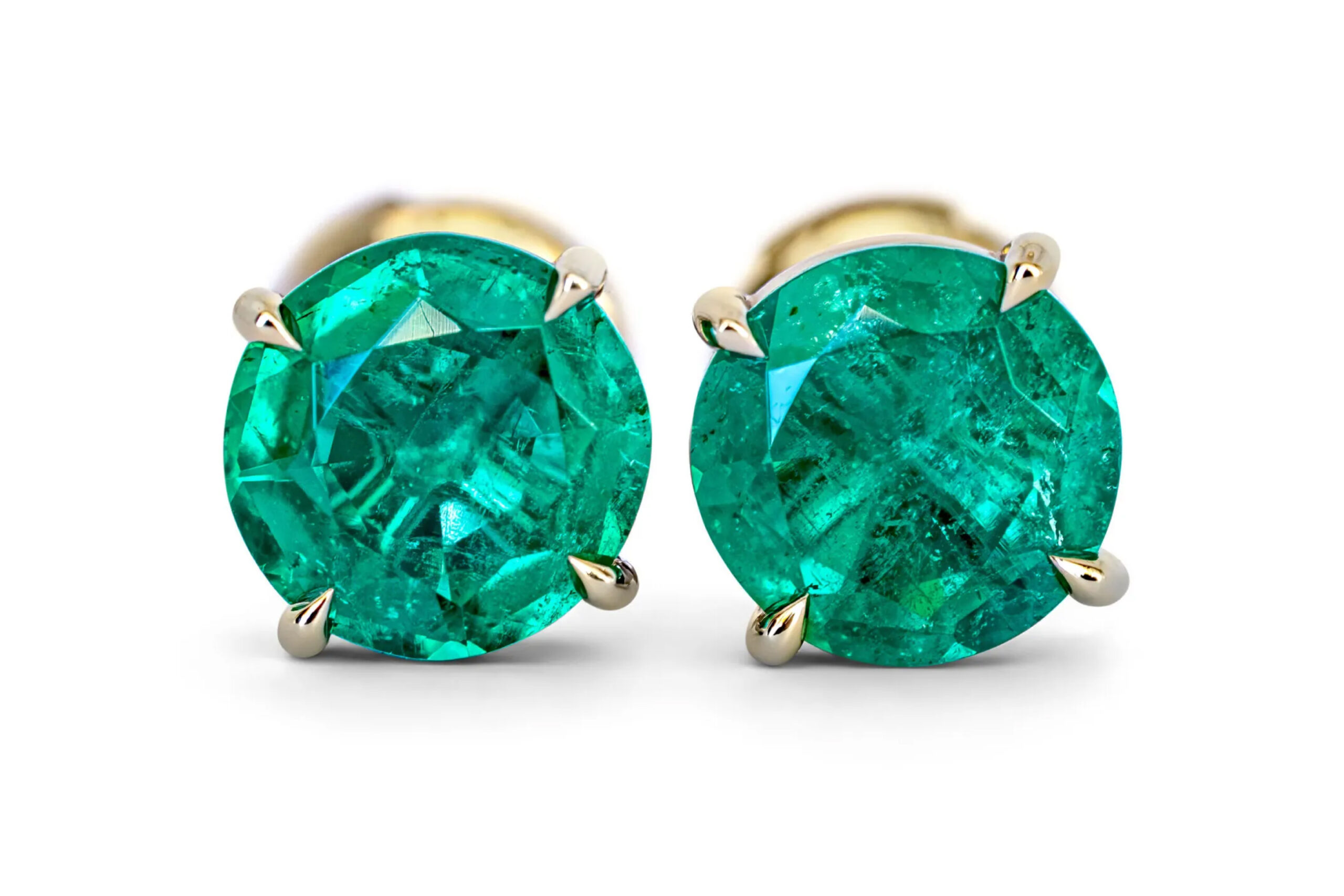 A rectangular bright green emerald with a classic step cut.