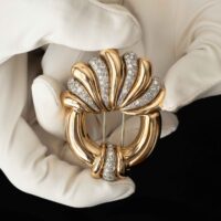 Round Diamond Brooch in Gold and Platinum