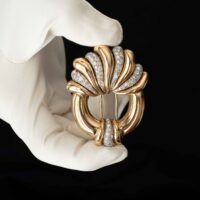 Round Diamond Brooch in Gold and Platinum