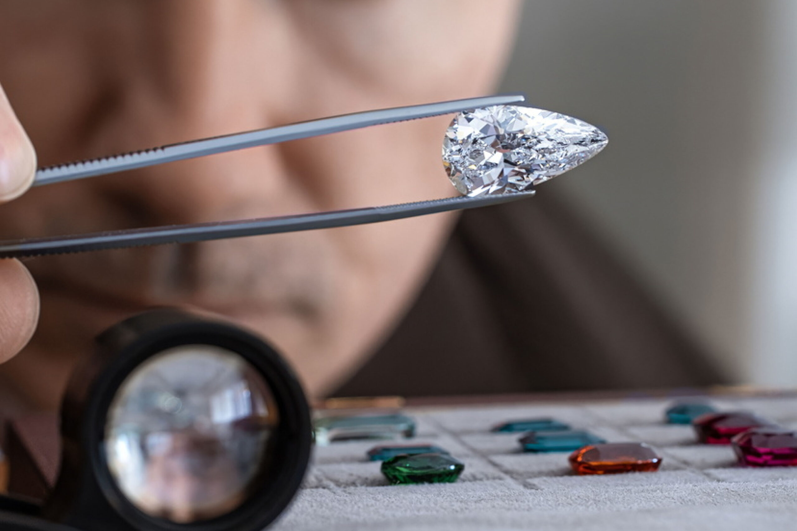 Eduard checking diamond with tweezers