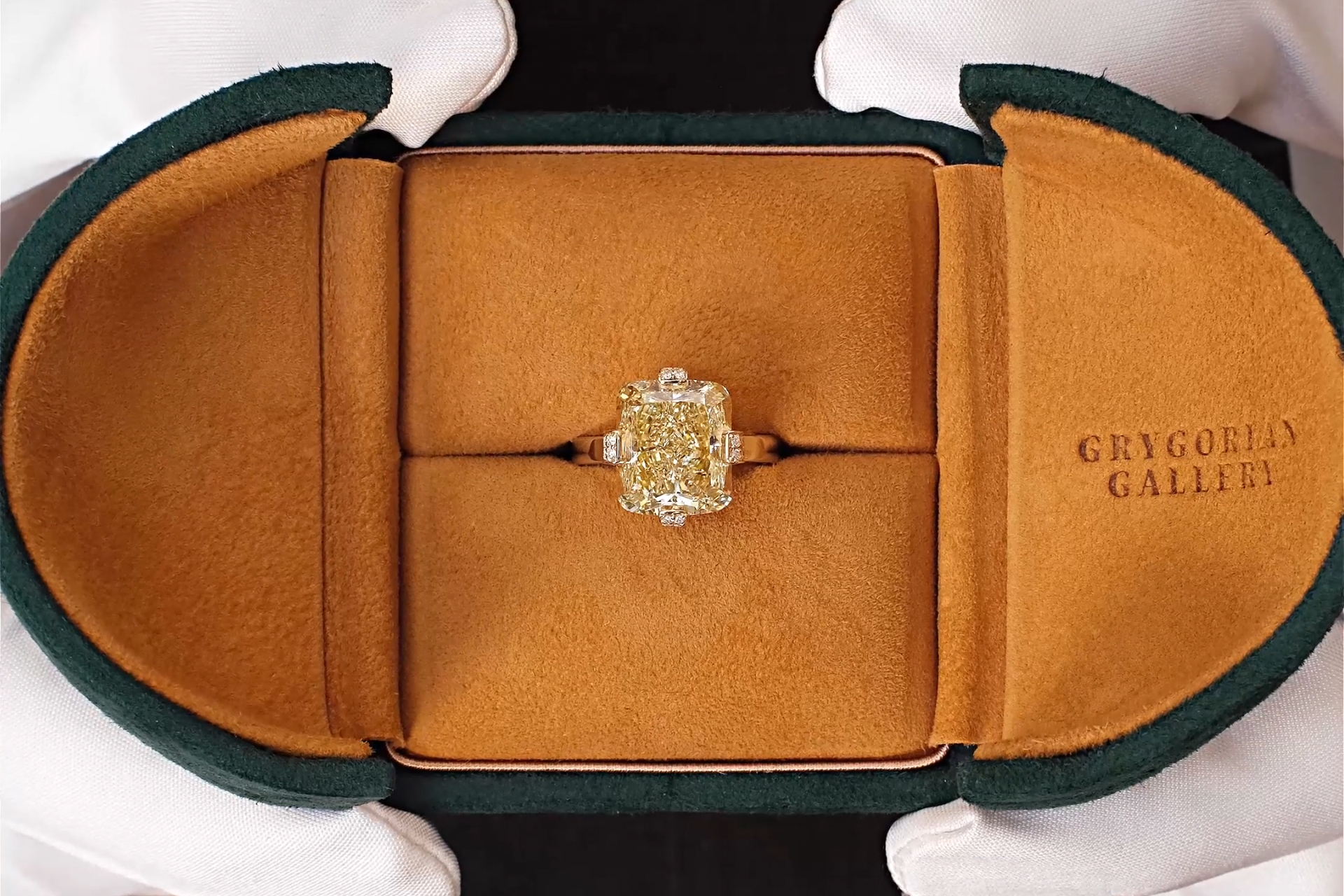 10.31 carat Fancy Intense Yellow Radiant Diamond Ring in the box
