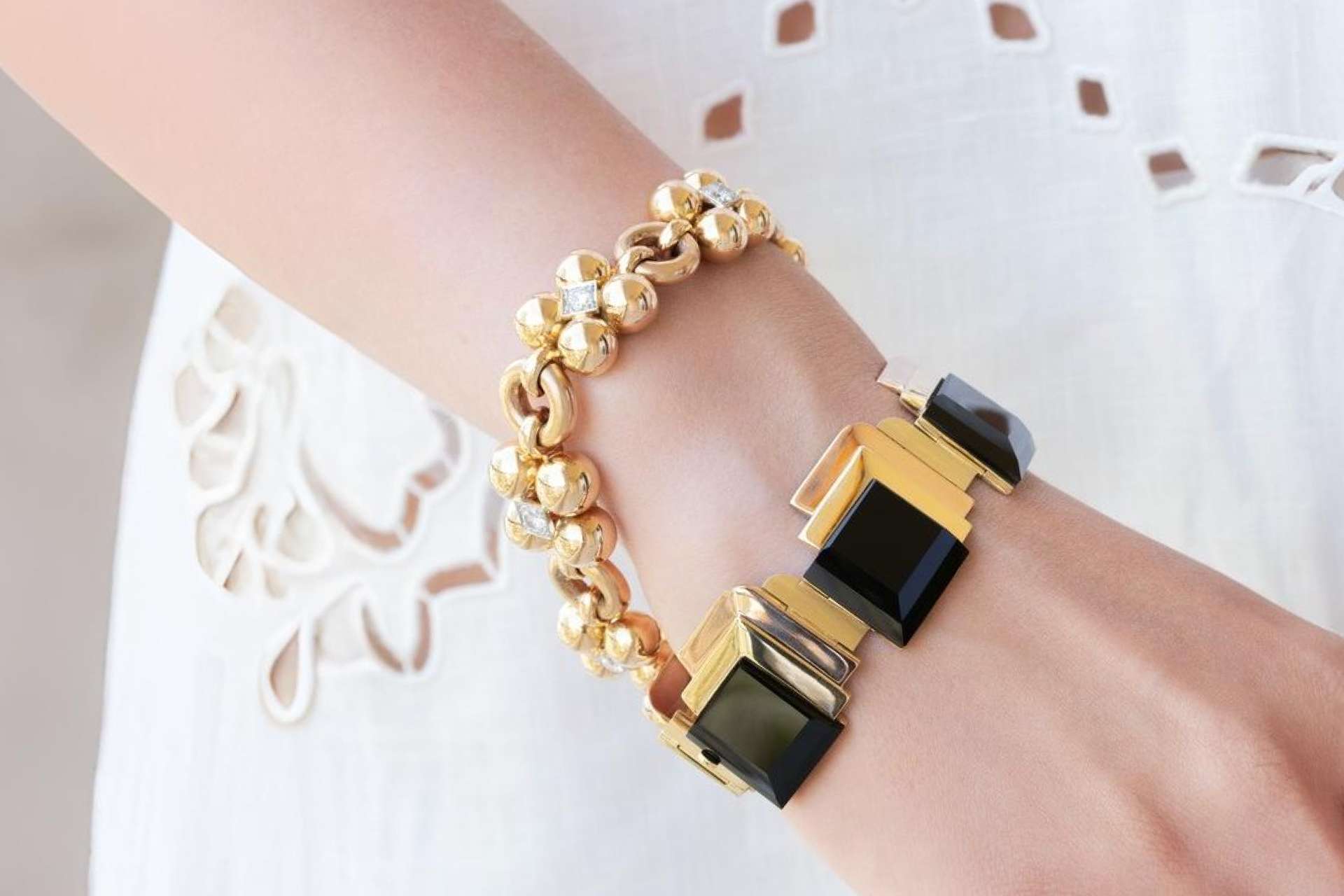 Two Bracelets on Woman's Hand