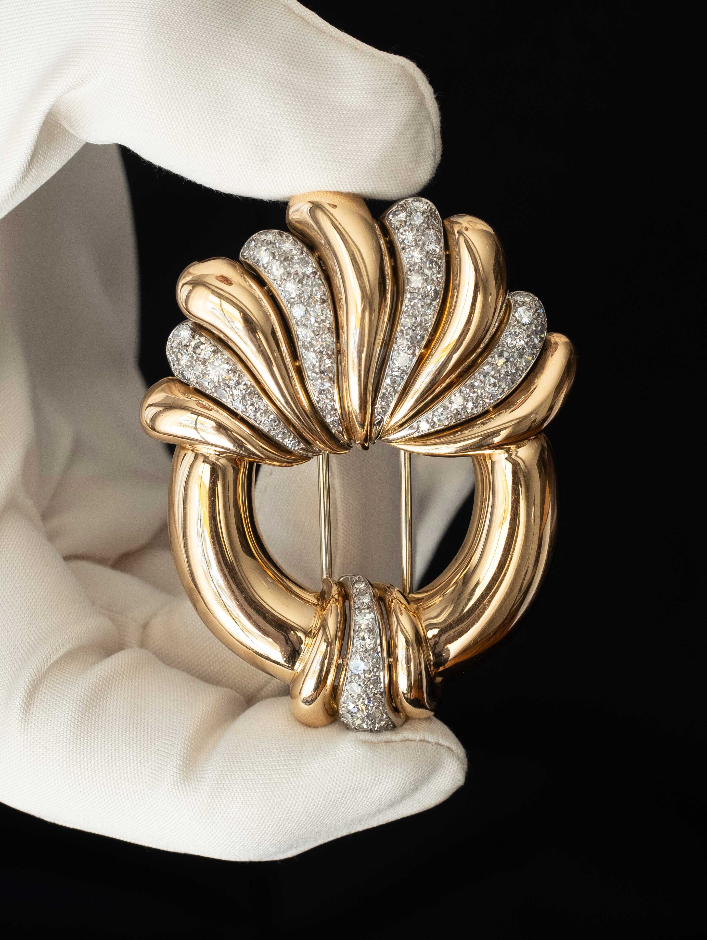 Art deco brooch in white glove