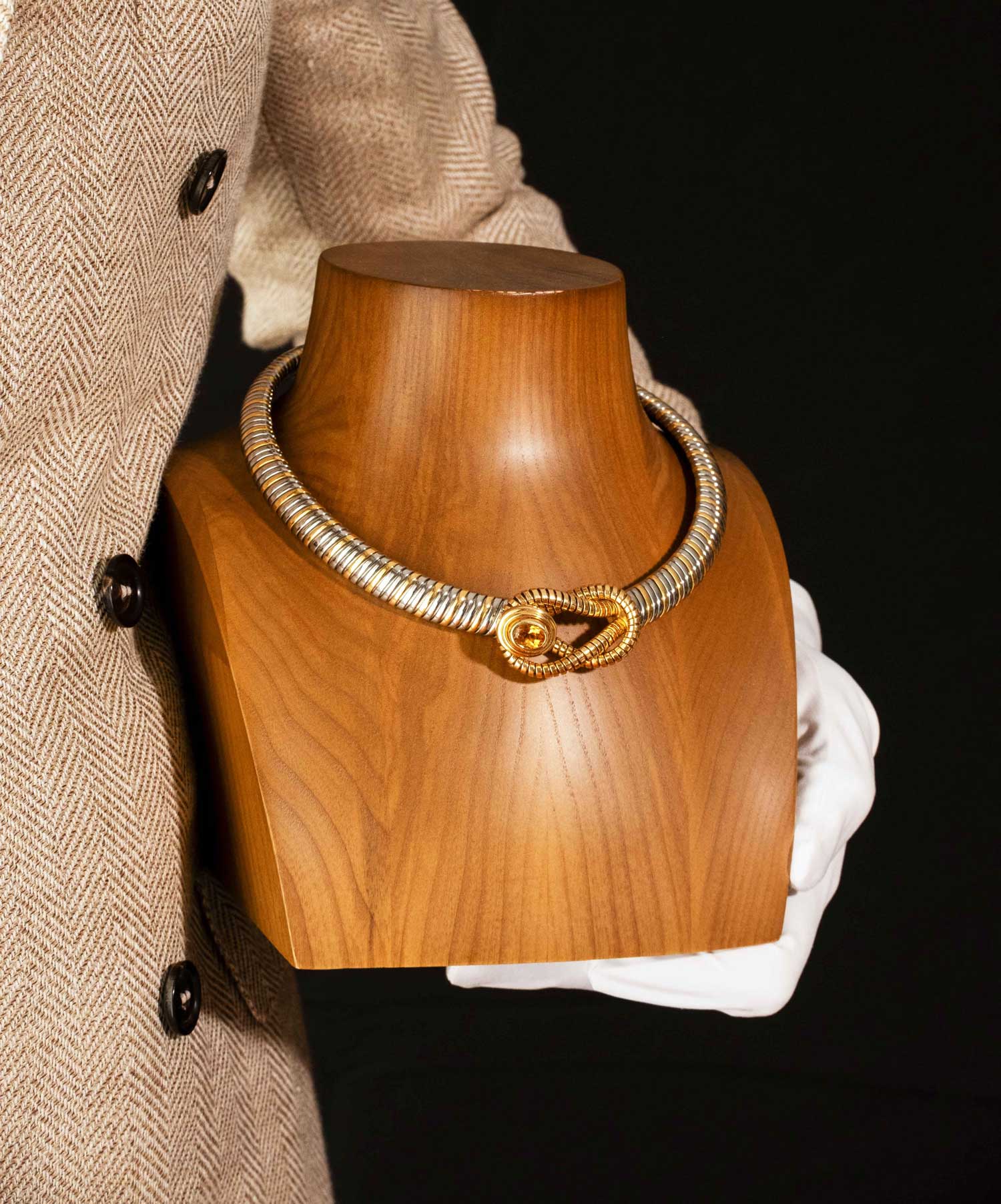 Citrine necklace on a wooden bust