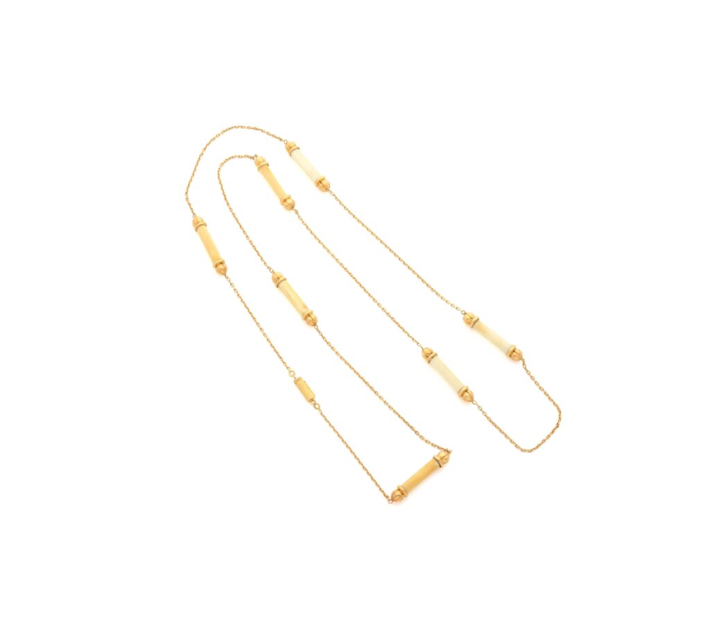 Sautoir vintage Cartier en or jaune et ivoire naturel