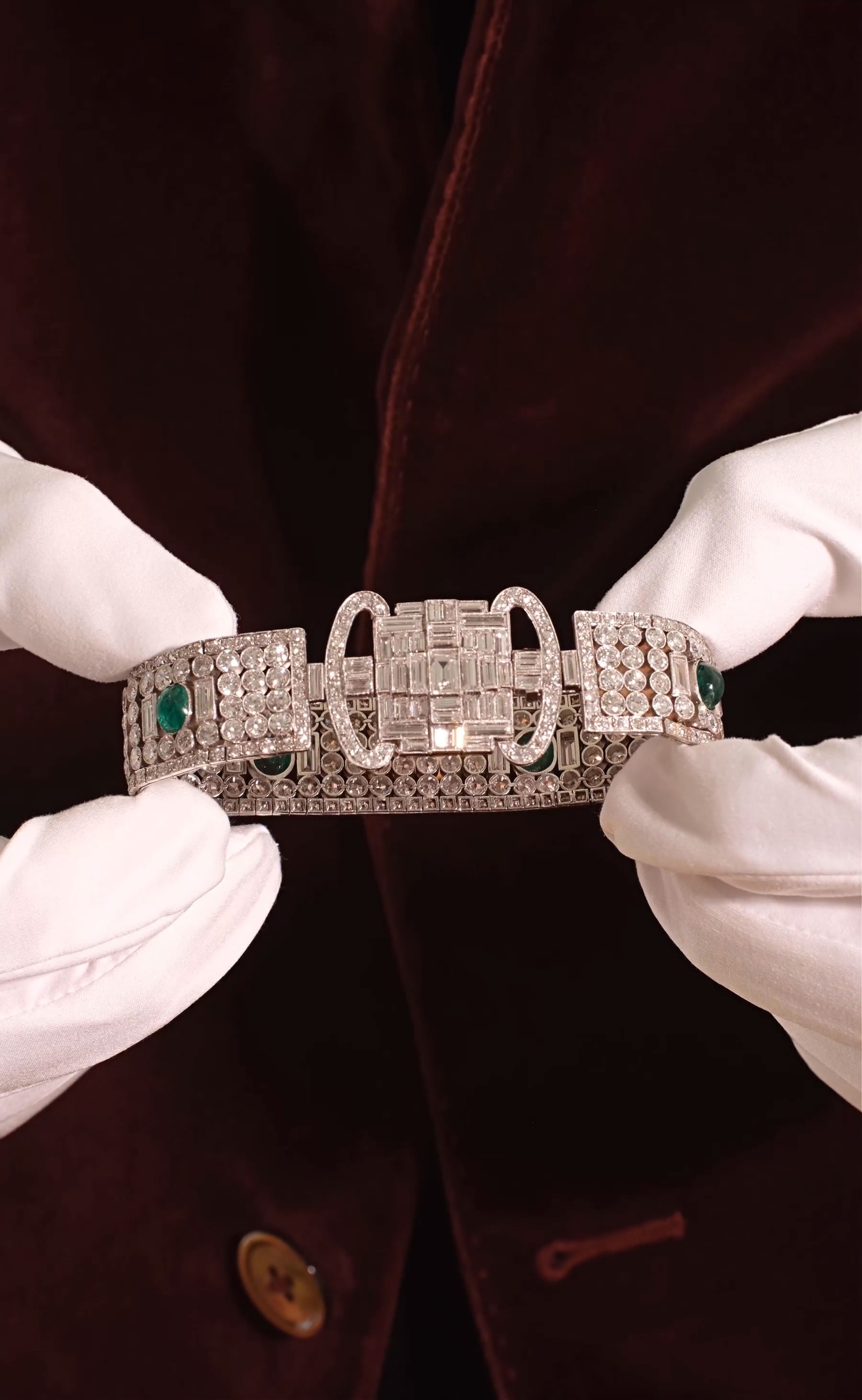 1920s Platinum Diamond Ribbon Bracelet with Emeralds