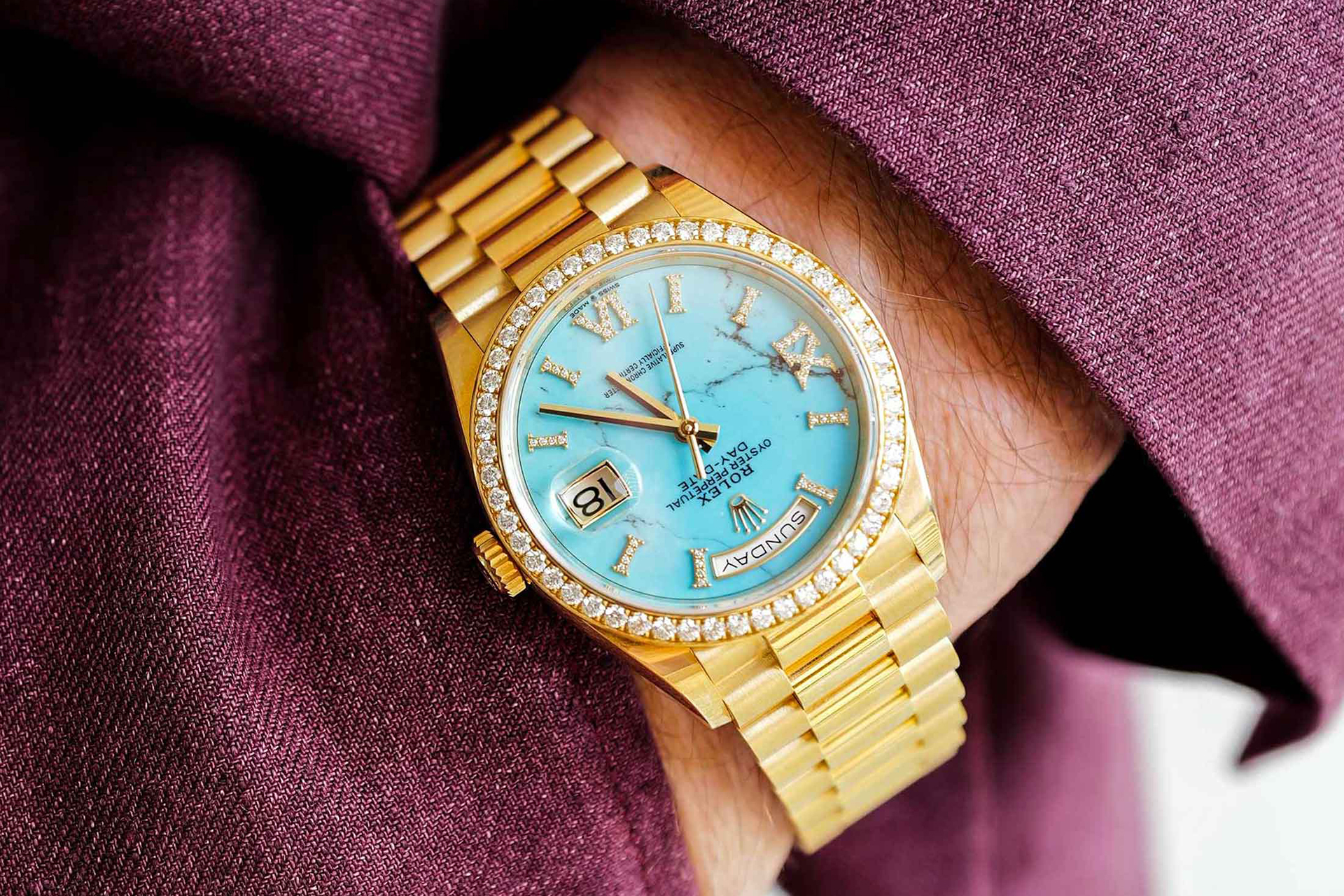 rolex oyster perpetual day date on hand in pocket