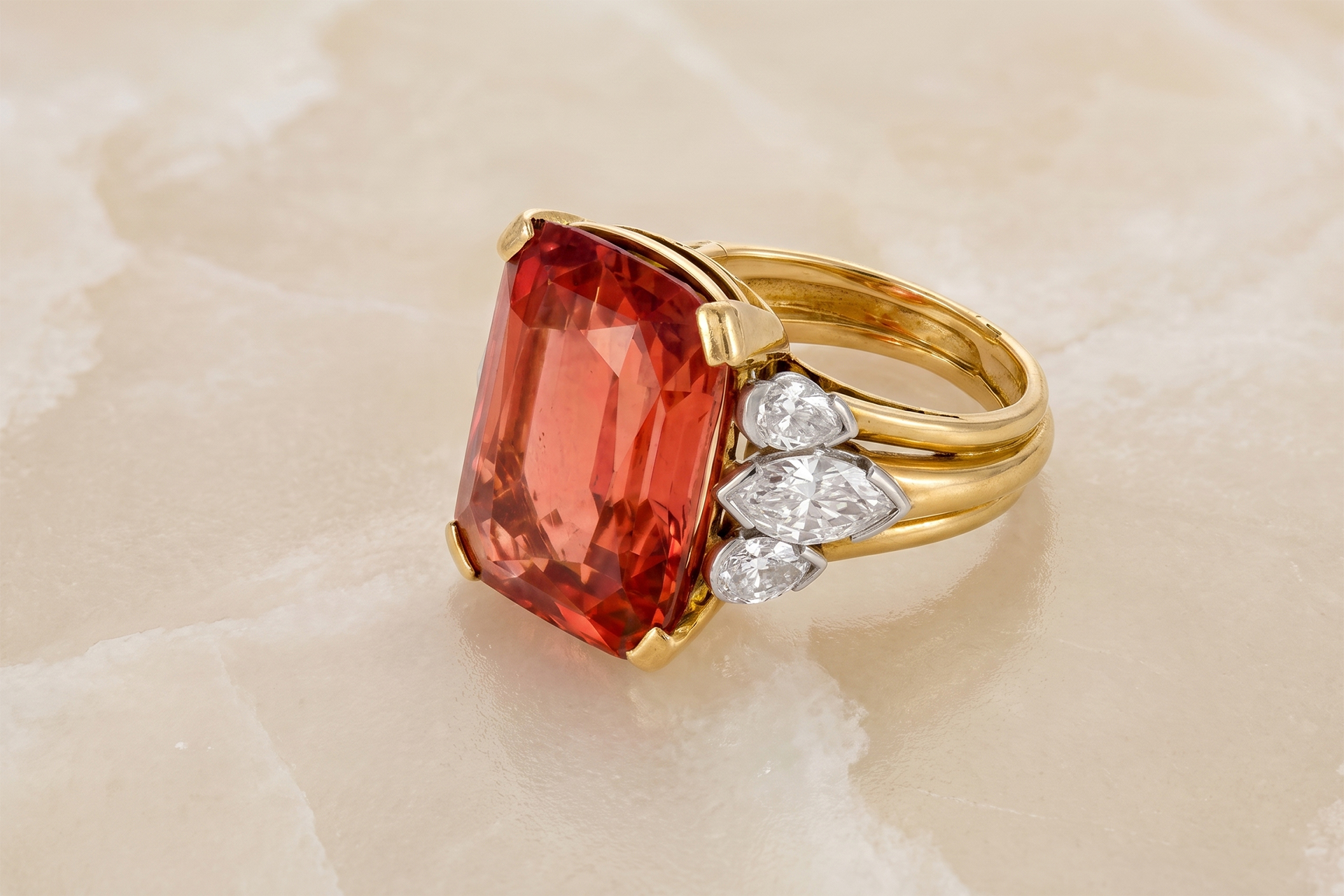 The du Pont Padparadscha, 24.58 carats, cushion modified mixed cut, unheated, signed Perry, AGL report