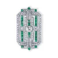 Broche Art déco en diamants et émeraudes