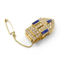 Broche à clip avec diamants et saphirs
