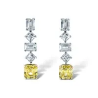 Boucles d’oreilles en diamants blancs et jaunes