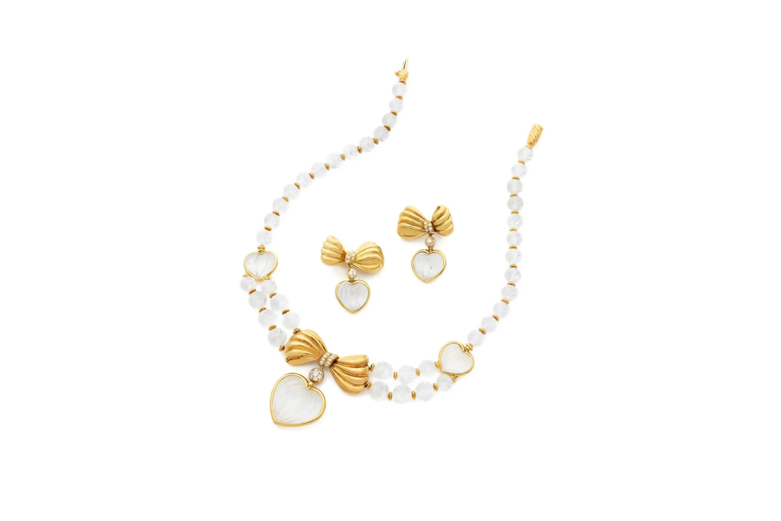 The BOUCHERON ROCK CRYSTAL & DIAMOND NECKLACE SUITE on the white background