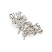 Broche florale en platine avec diamants, transformable en deux broches