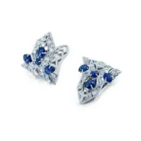 Boucles d’oreilles et broches Art déco françaises en diamants et saphirs